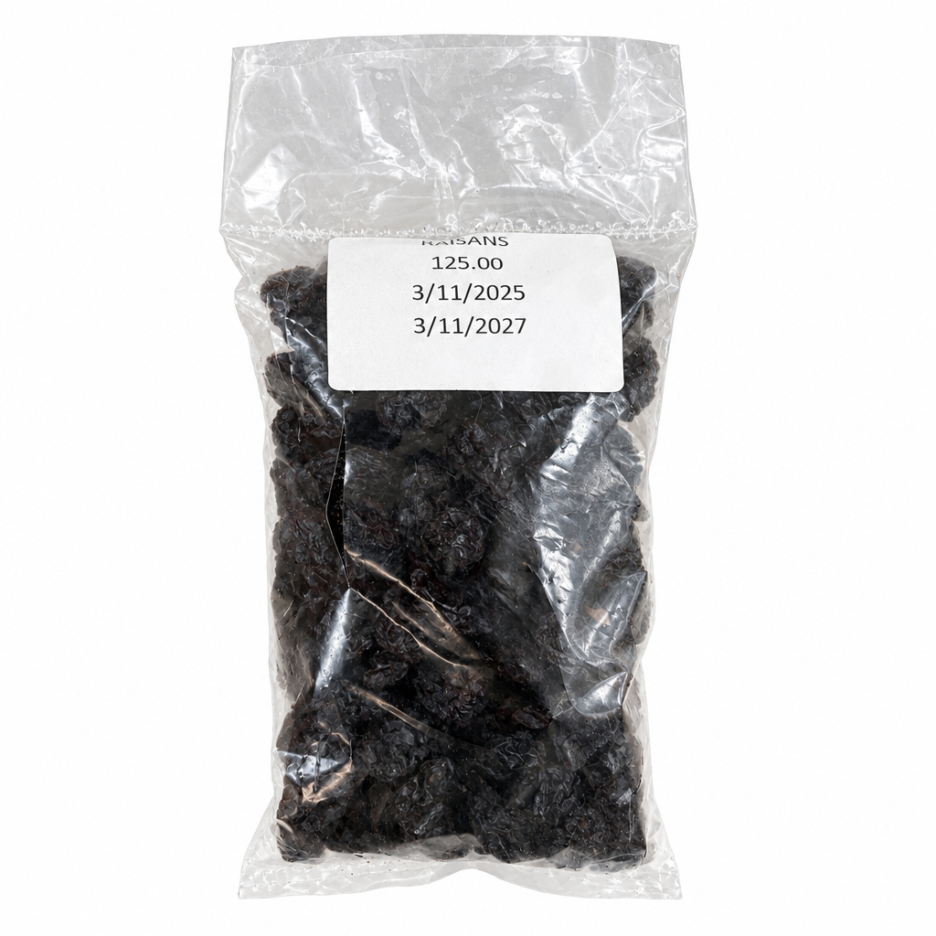 Bag of dark dried fruit on a white background